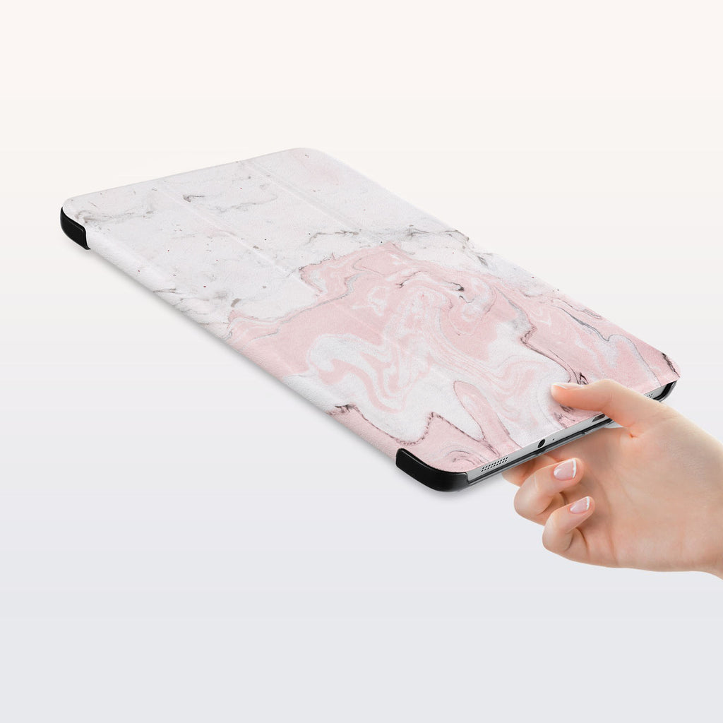 a hand is holding the Personalized Samsung Galaxy Tab Case with Pink Marble design