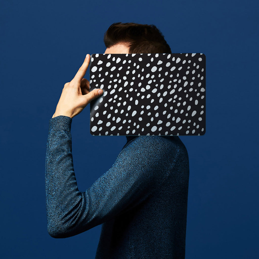 The form-fitting glossy hardshell case with Polka Dot design