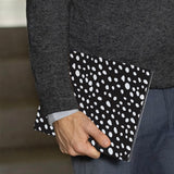 A business man holds Personalized VistaCase reMarkable Pen Holder Case with Polka Dot design