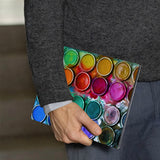 A business man holds Personalized VistaCase reMarkable Pen Holder Case with Science design