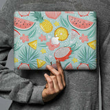 Form-fitting hardshell with Tropical Fruits design keeps scuffs and scratches at bay