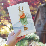 a girl holding personalized RFID blocking passport travel wallet with Winter Charm design