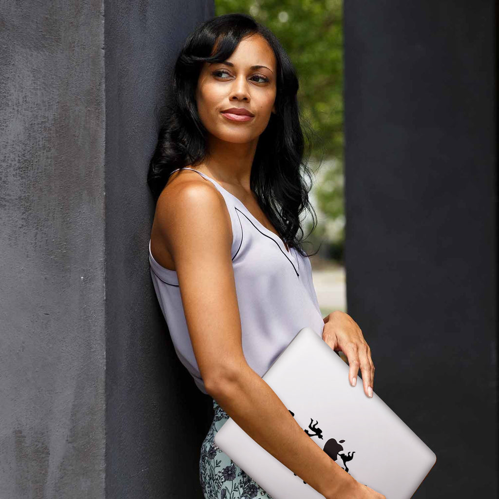 A yong girl holding personalized microsoft surface laptop case with Extreme Sports design