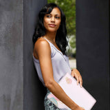 A yong girl holding personalized microsoft surface laptop case with Marble Art design