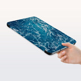 a hand is holding the Personalized Samsung Galaxy Tab Case with Ocean design