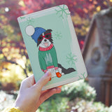 a girl holding personalized RFID blocking passport travel wallet with Furry Christmas design