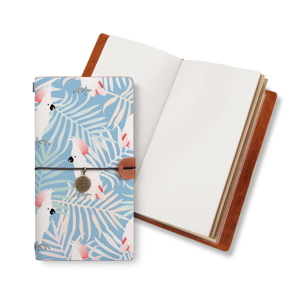 opened midori style traveler's notebook with Bird design